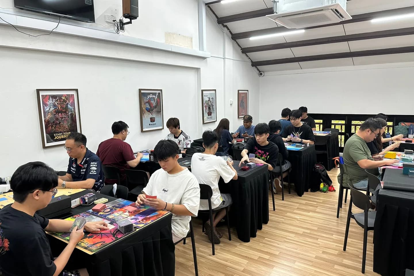 A packed tournament floor during an event at Cards Central.