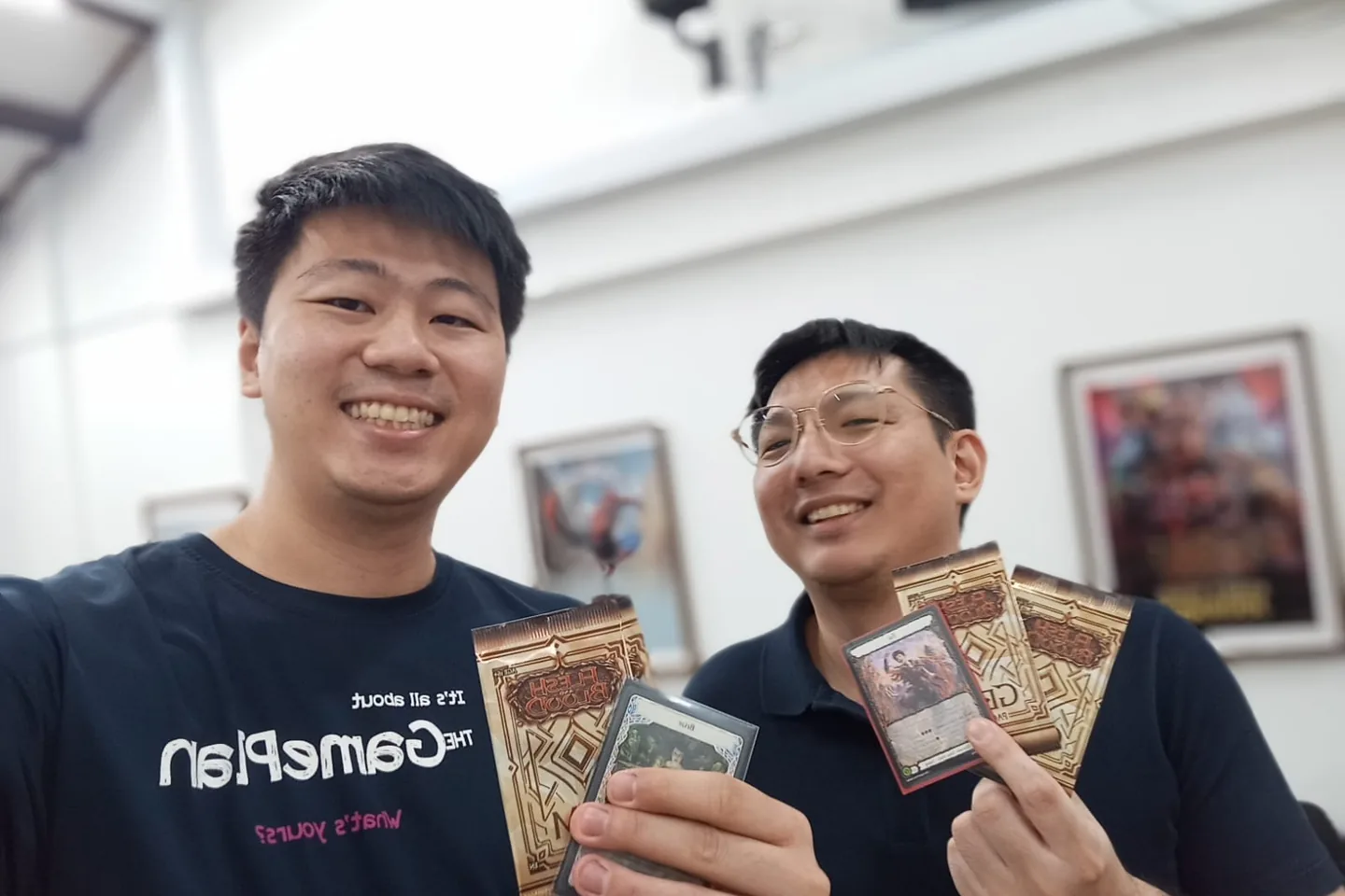 Vintage singles and modern cards showcased in a display case.